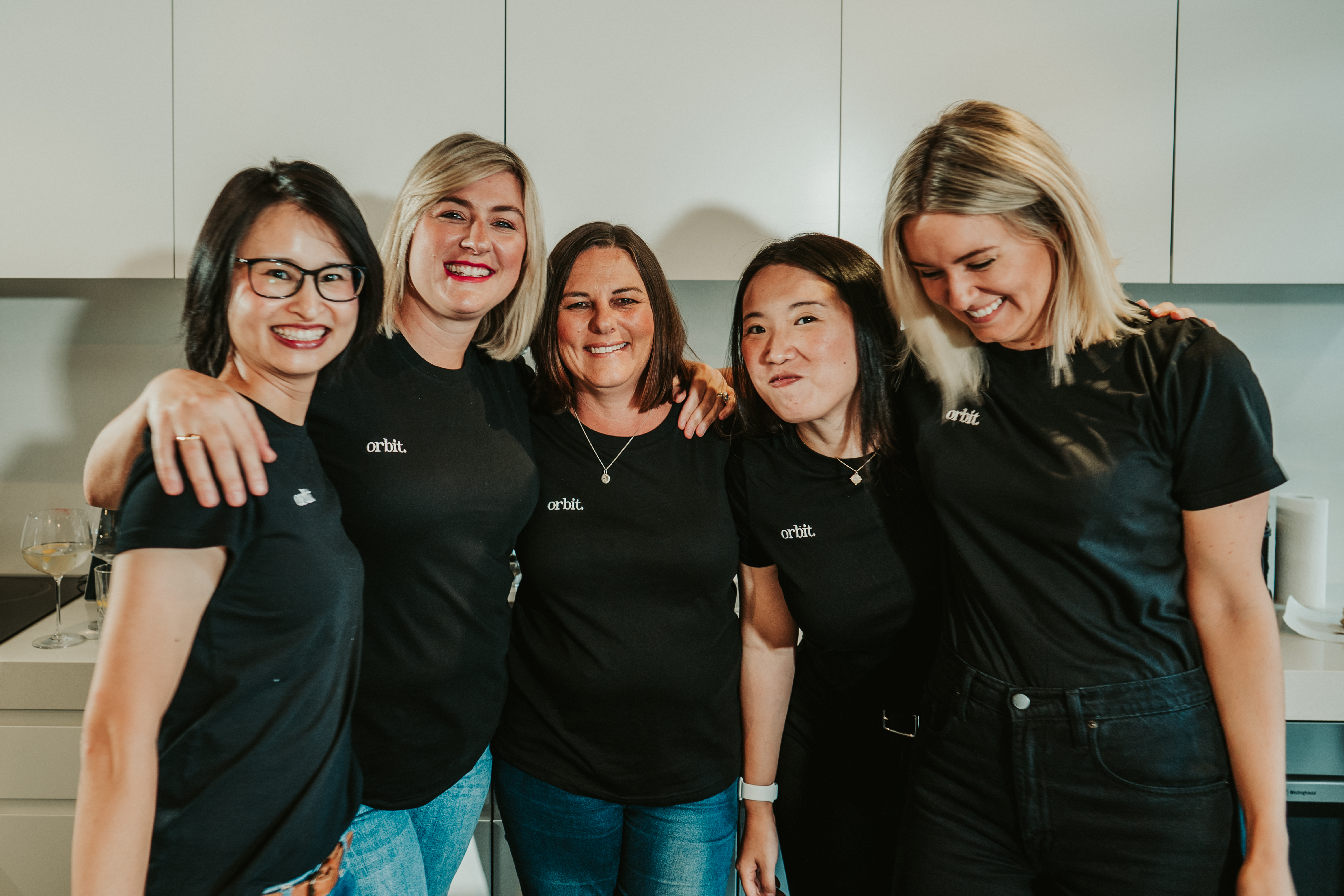 Orbit Team Hugging And Laughing In Sydney Office (pre Covid)