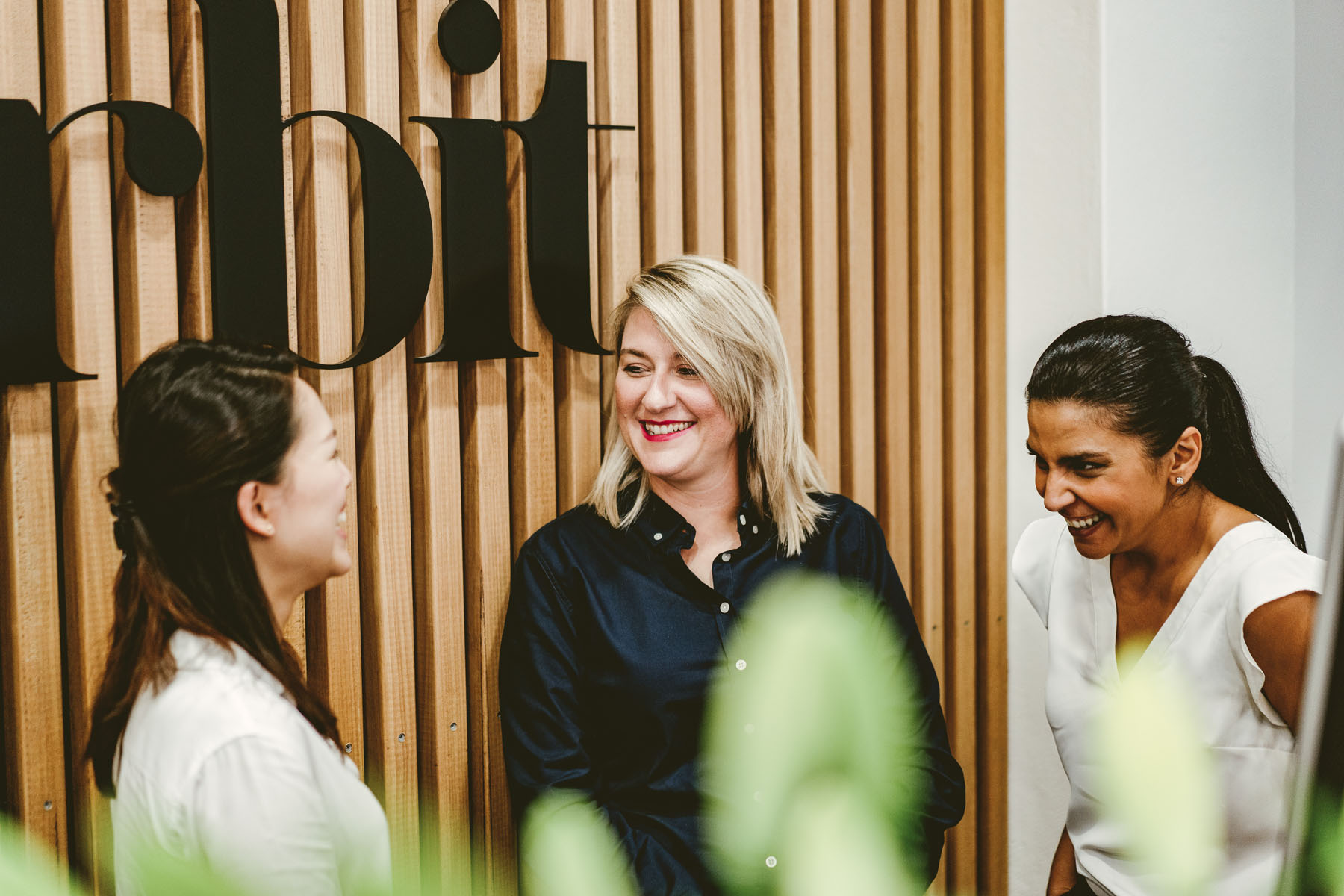 Amelia Laughing With Orbit Team In Sydney Office