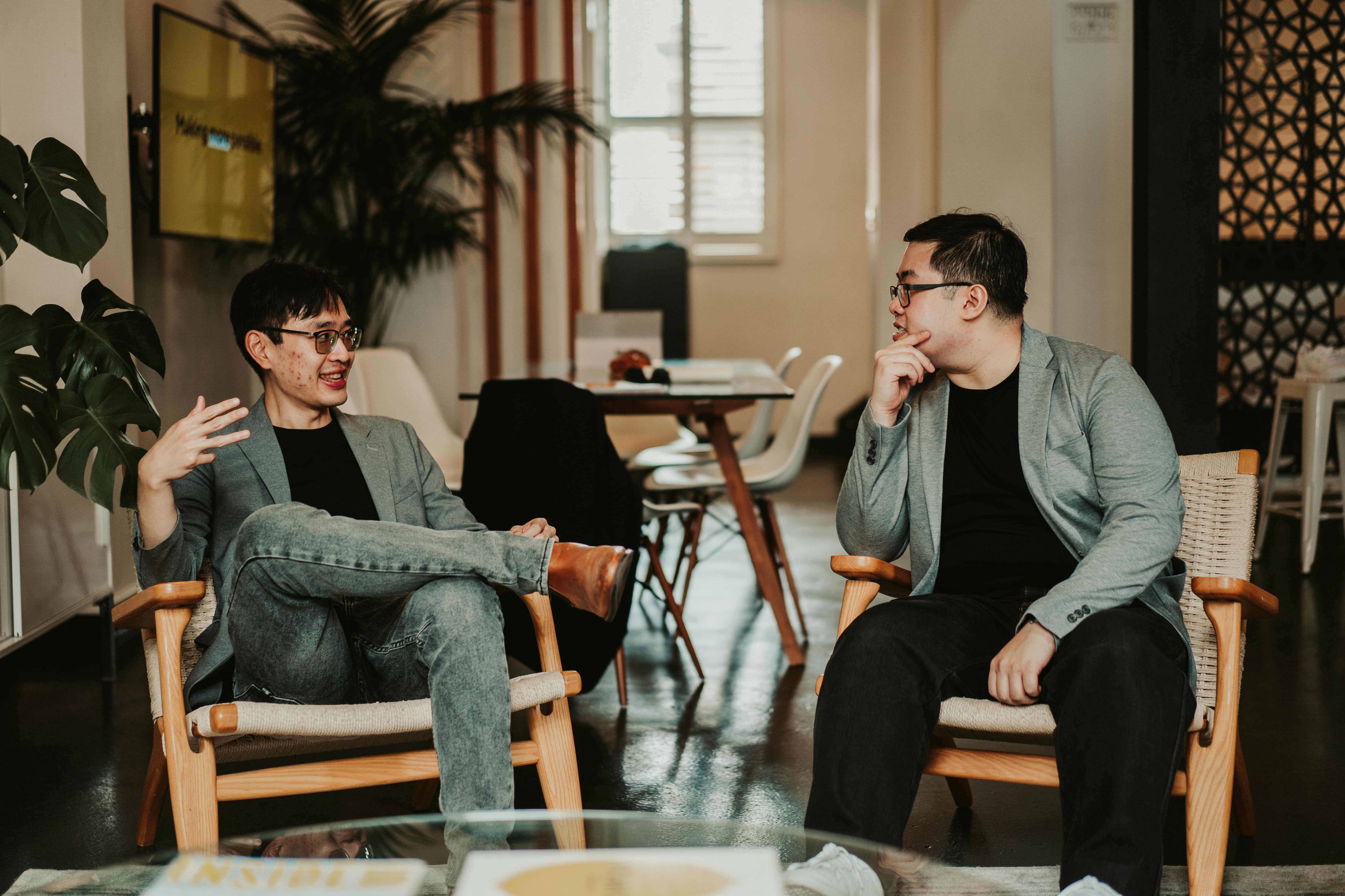 Orbit Team Members In Discussion At Sydney Office