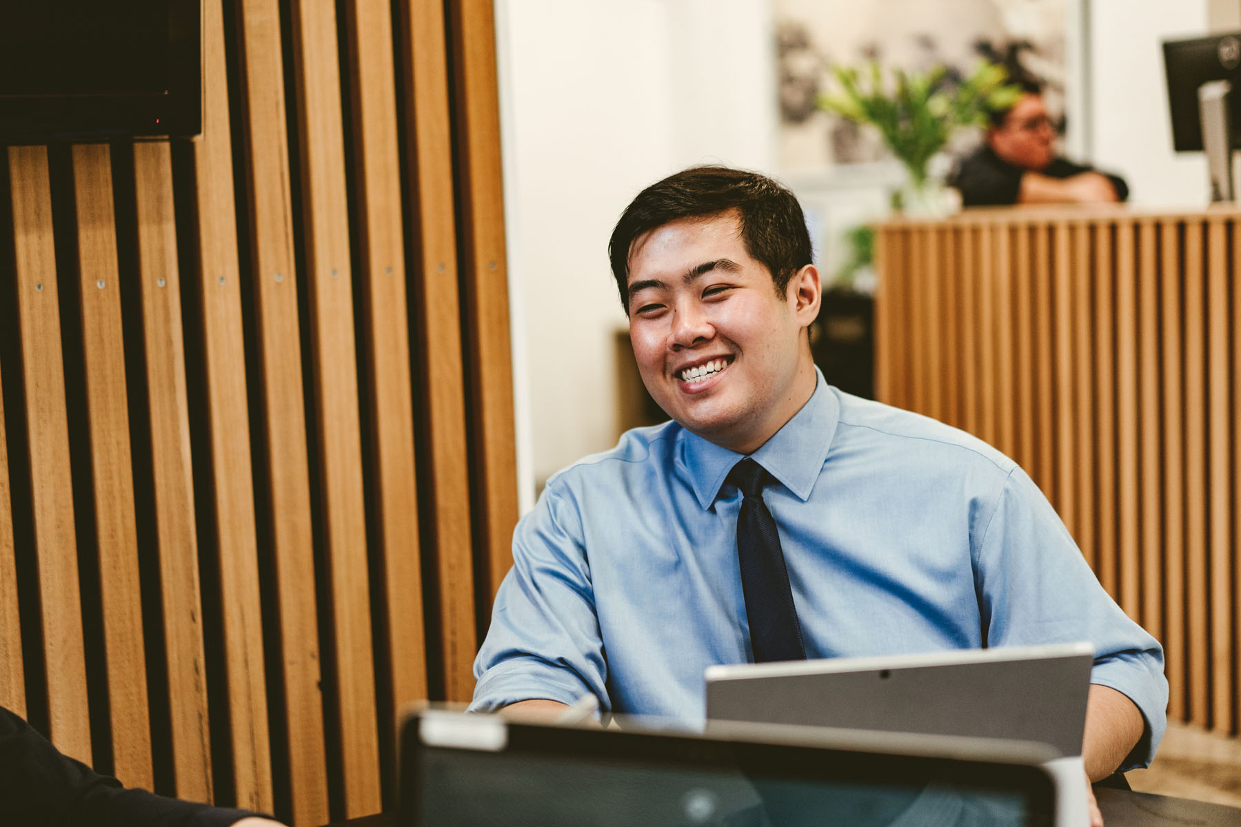 Orbit’s Smsf Administrator, Brian Luo, Smiling In The Sydney Office