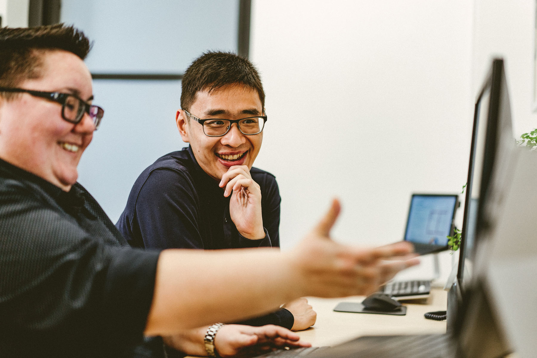 Orbit Team Members Reviewing Balance Sheet At A Computer In Sydney Office