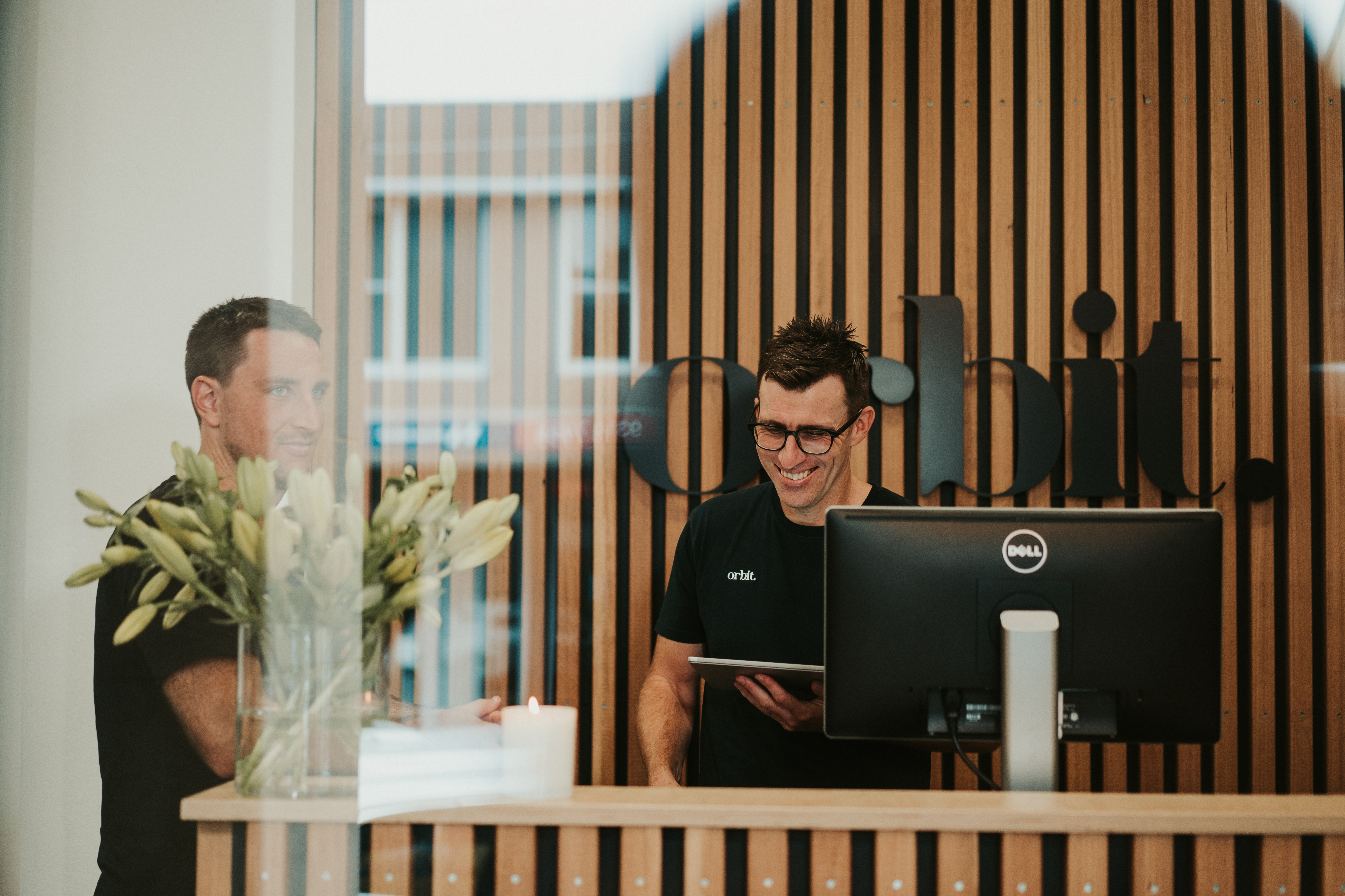 Orbit’s Co Founder, Greg, And Senior Accountant, Alex, In The Reception Of Sydney Office