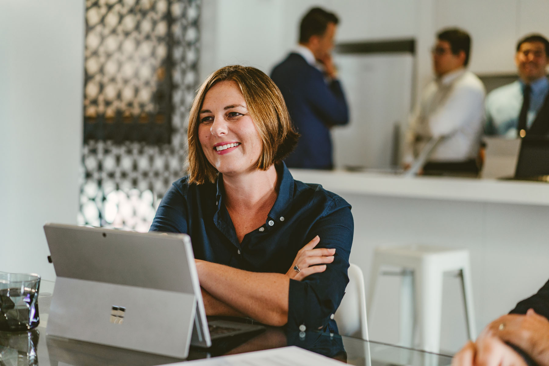 Orbit’s Senior Accountant, Rachel, Smiling In Meeting At Sydney Office