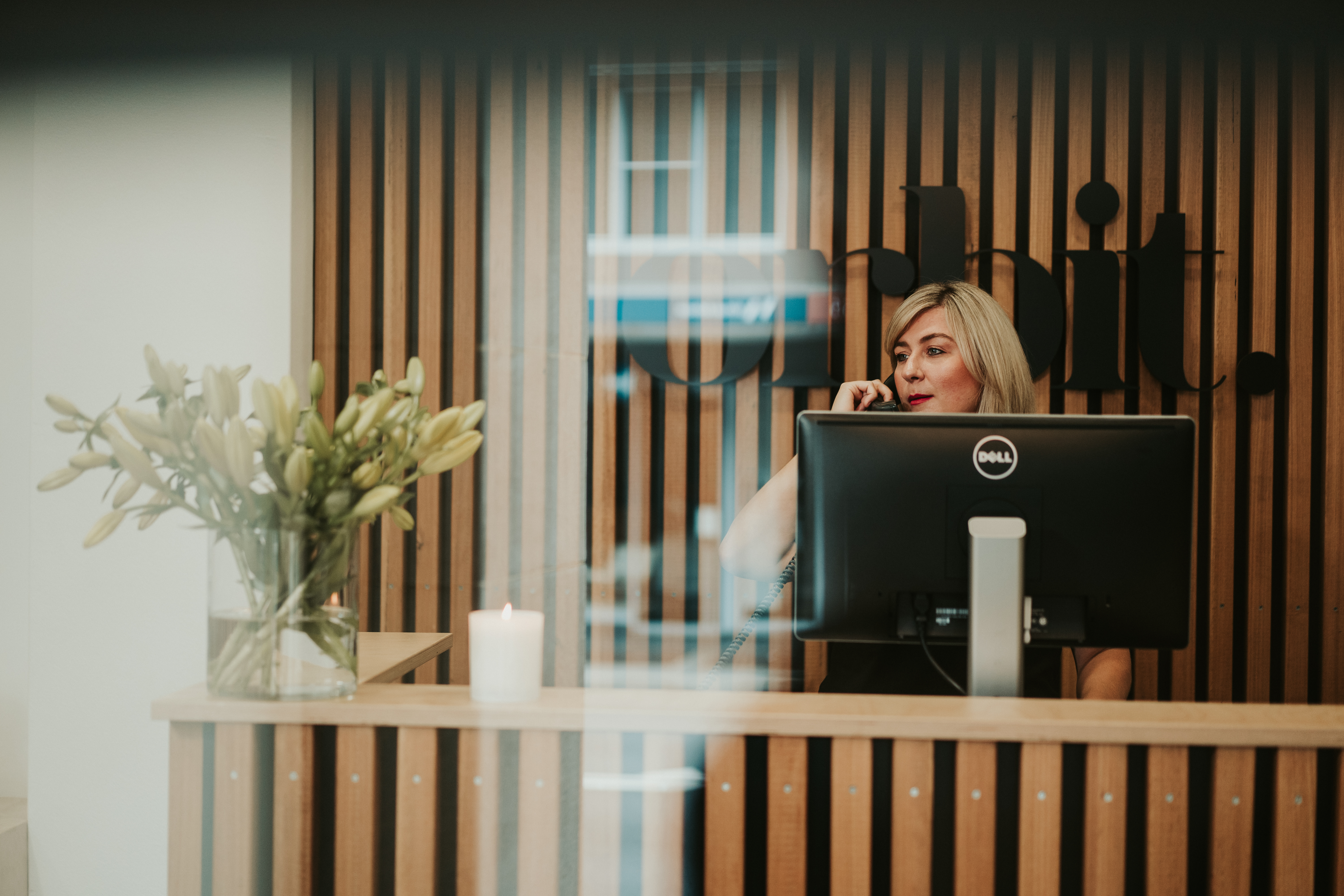 Amelia Talking On A Phone Call In Orbit’s Sydney Office