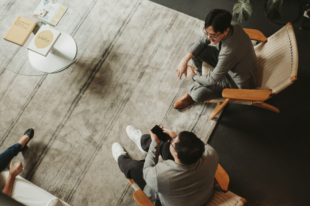 Birdseye View Of Orbit’s Smsf Accountant, Eric Kurnadi And Smsf Administrator, Brian Luo Conversing In Sydney Office