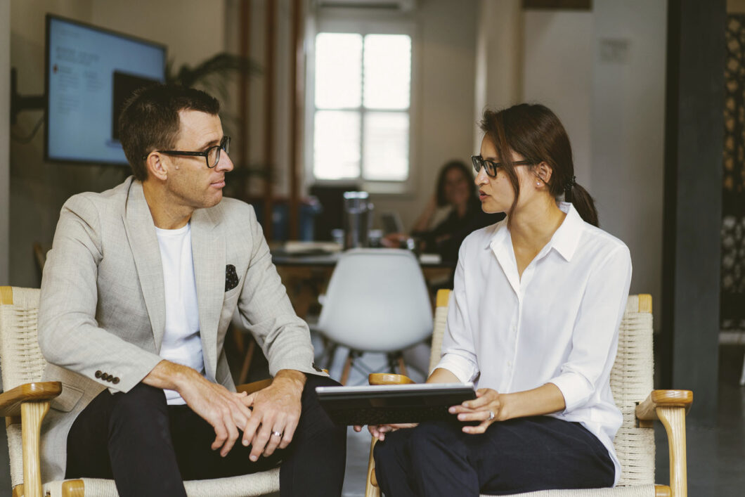 Orbit’s Co Founder, Cpa & Director Greg Dennis And Senior Business Accountant Susan Huang In Meeting At Randwick Office